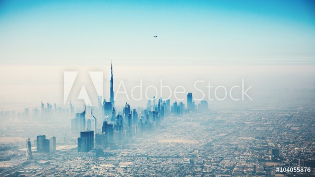 Bild på Dubai city in sunrise aerial view